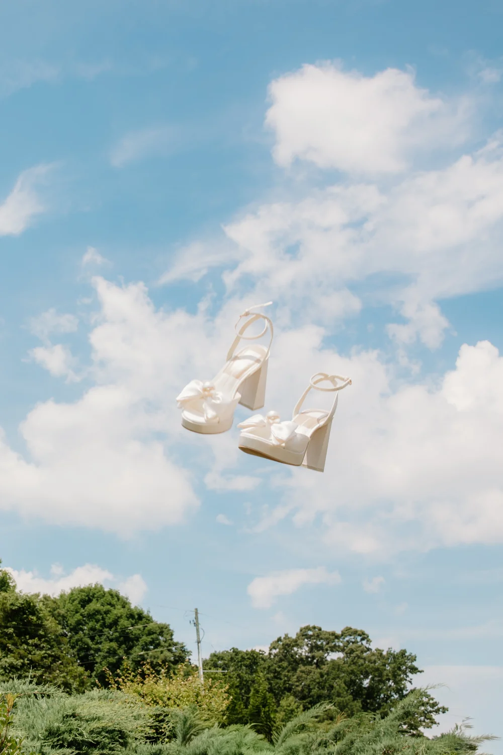 Wedding shoes in the air