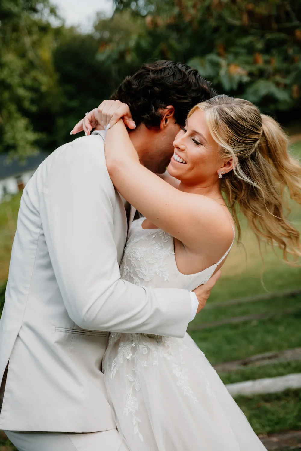 A couple holding each other in the garden