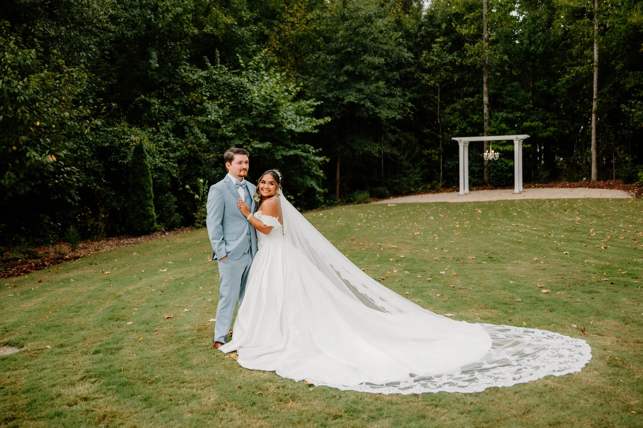 Couple on the lawn at White Fox Cottage in Commerce, Georgia