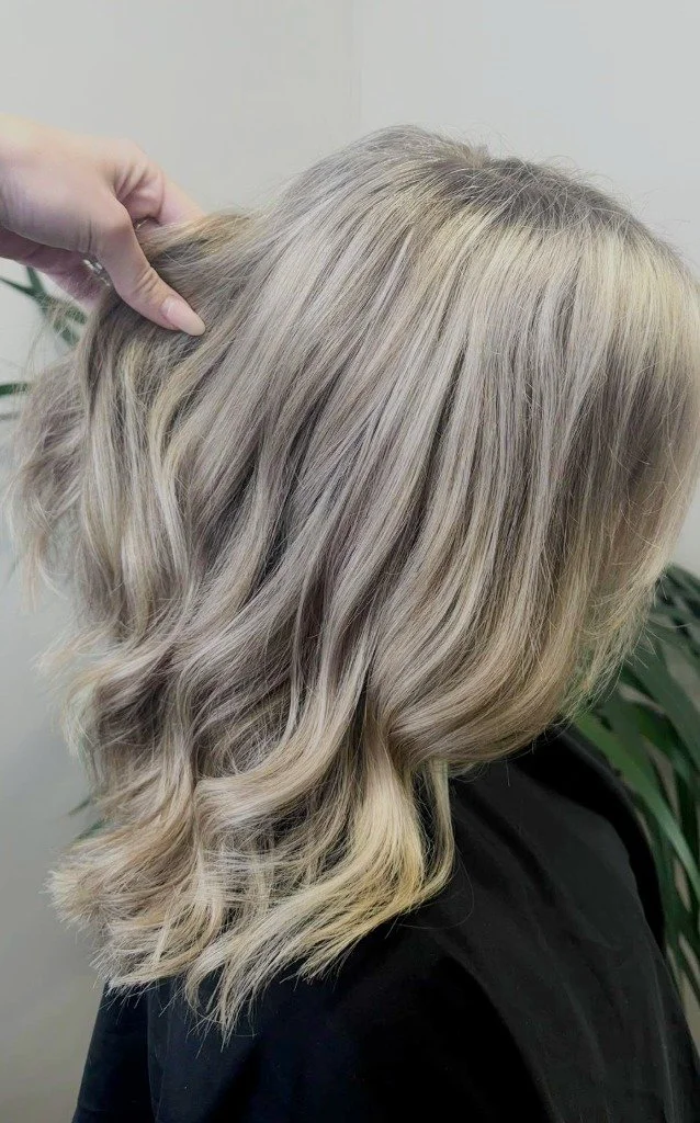 Silver and grey hair blended with soft lowlights