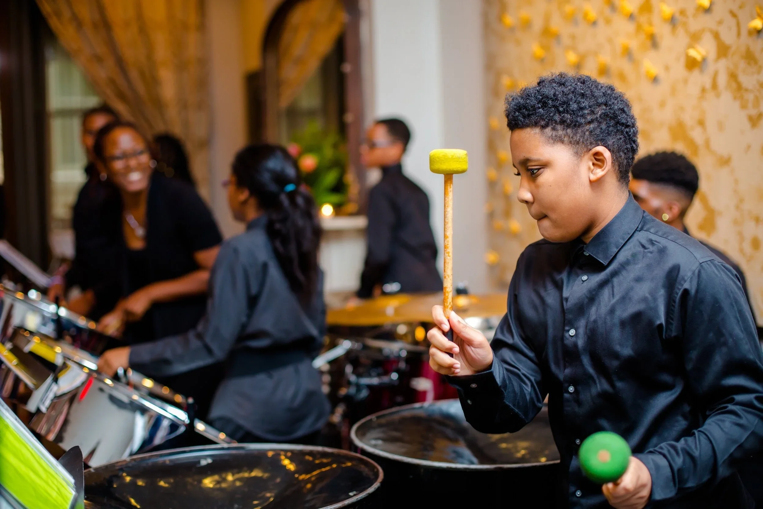 CAFE steelpan performer at a formal event