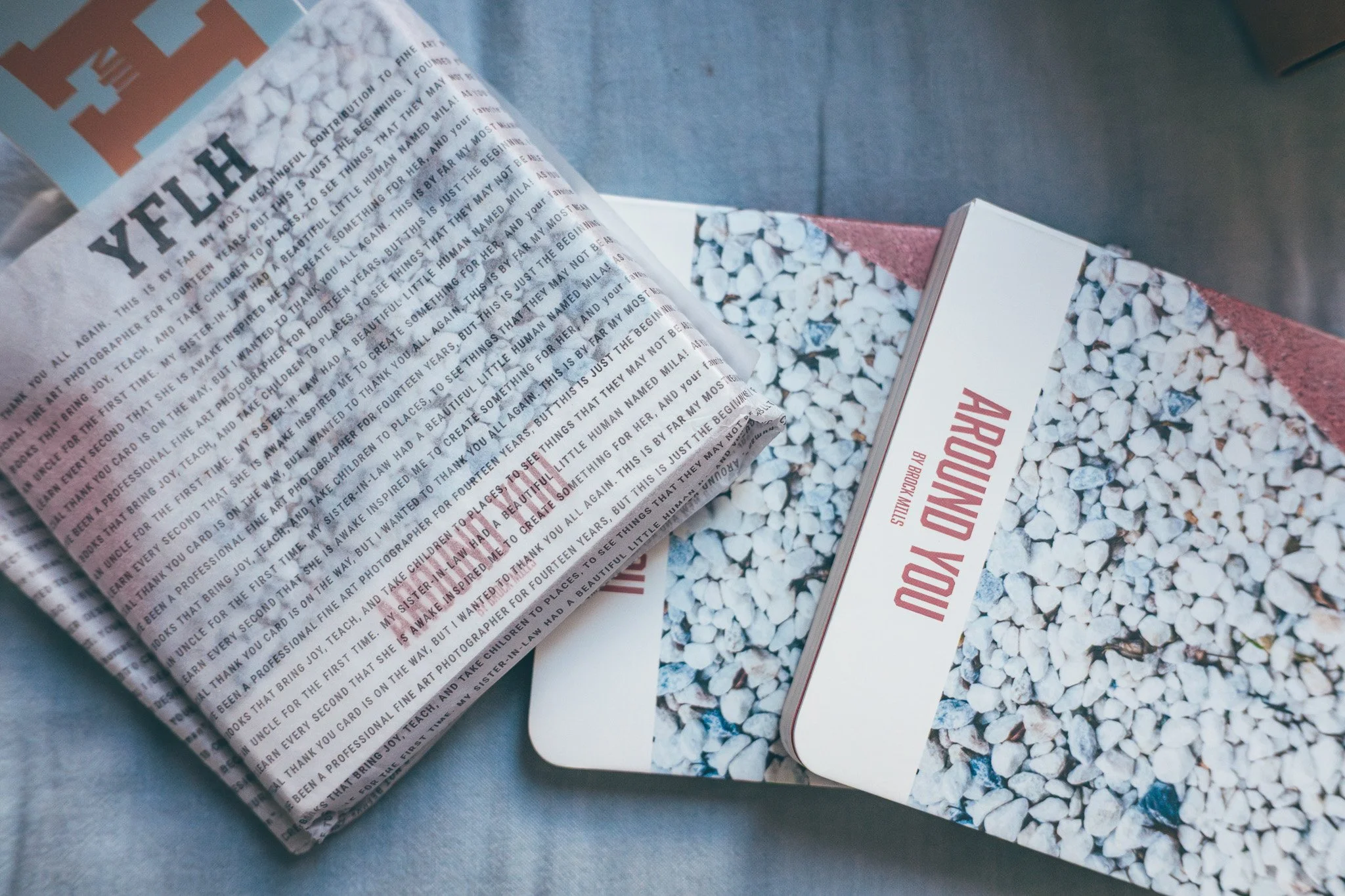 Three copies of AROUND YOU fine art board book by Brock Mills