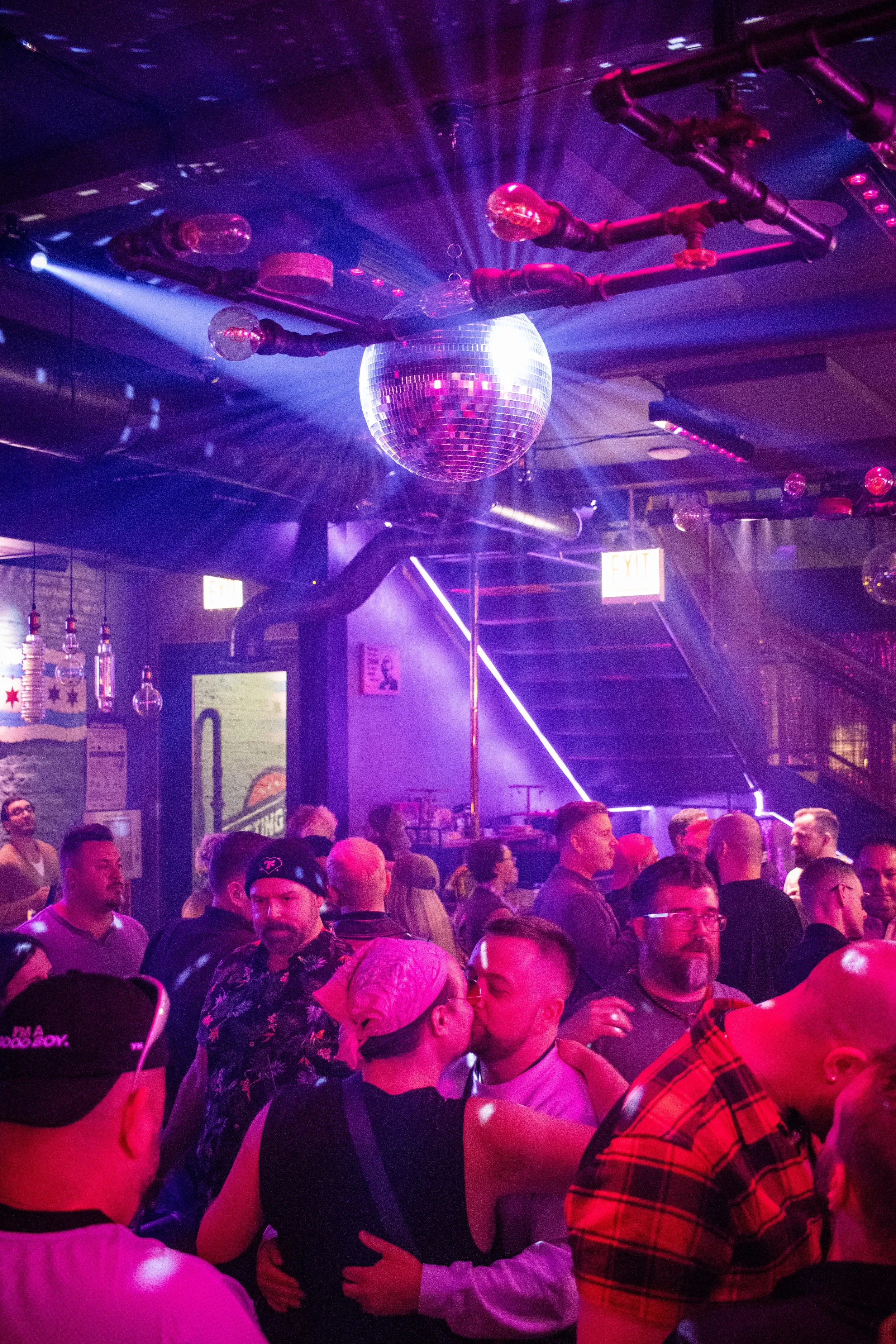 Lively crowd at Meeting House Tavern, an LGBTQ+ friendly bar in Andersonville, Chicago