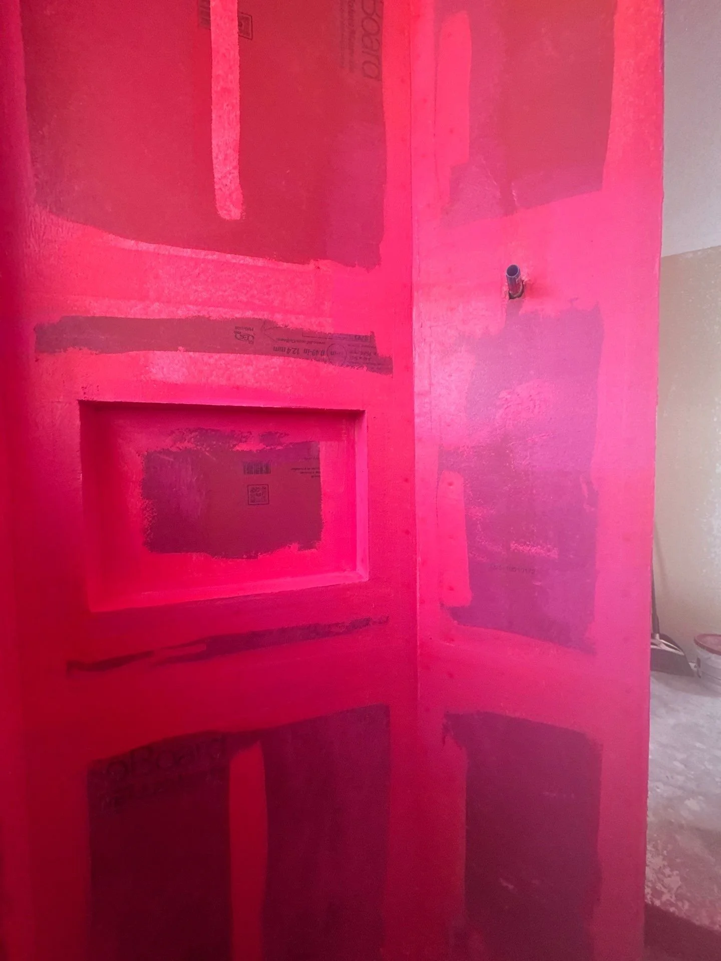 Actual DCI shower waterproofing preparation with RedGard before tile