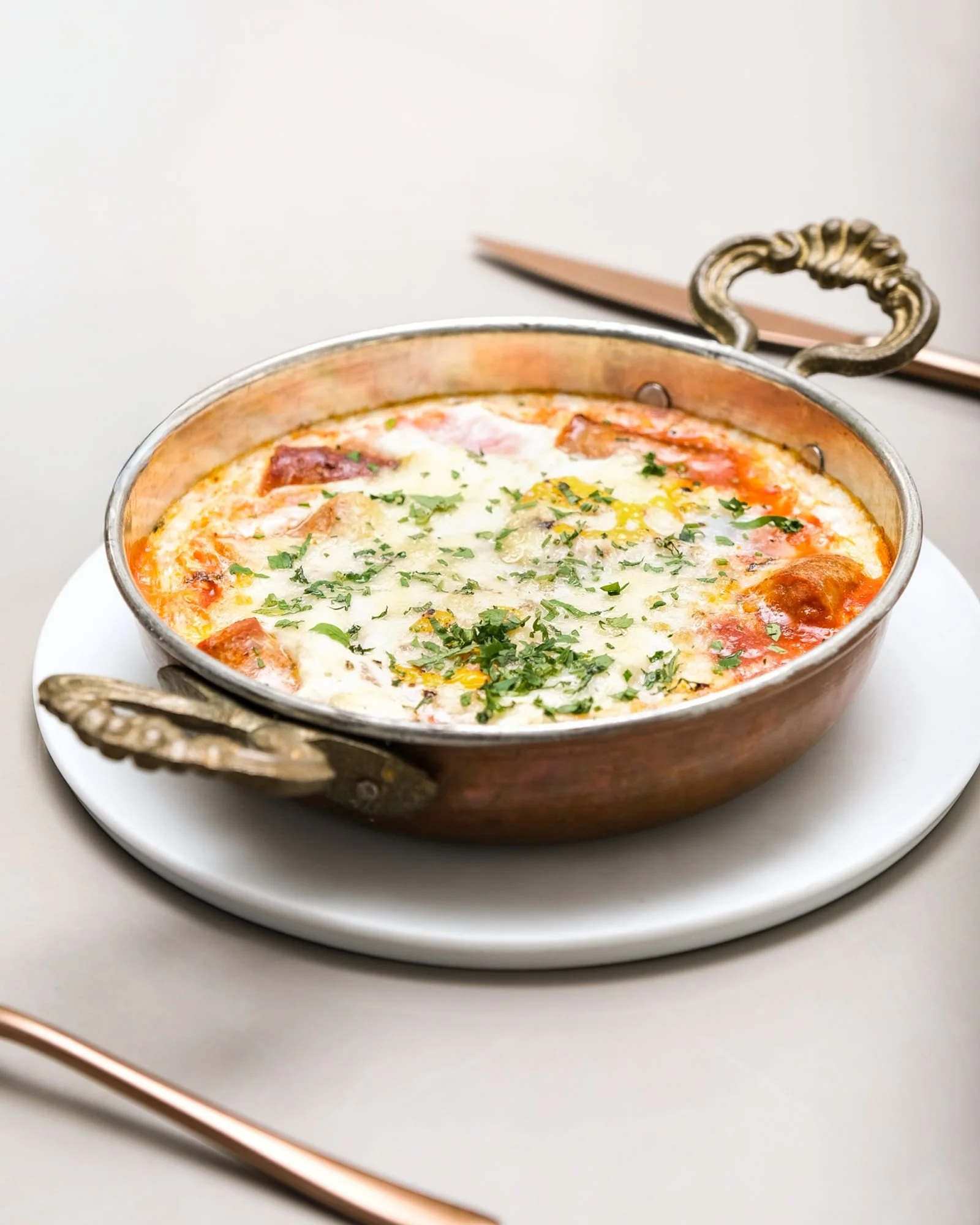 Fried Eggs, Eggs in a Casserole with Tomato Sauce and Provolone