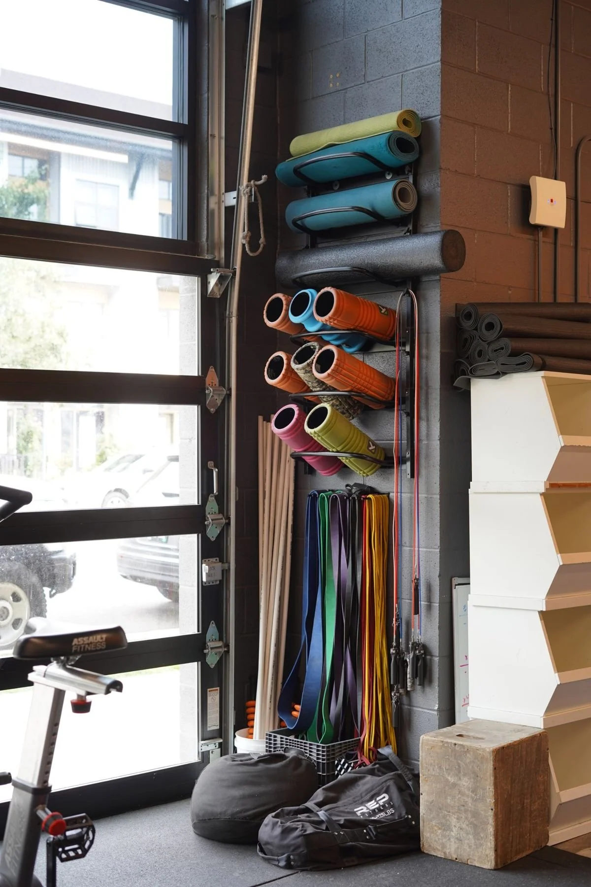 Mobility wall with foam rollers, bands, PVC pipes and sandbags