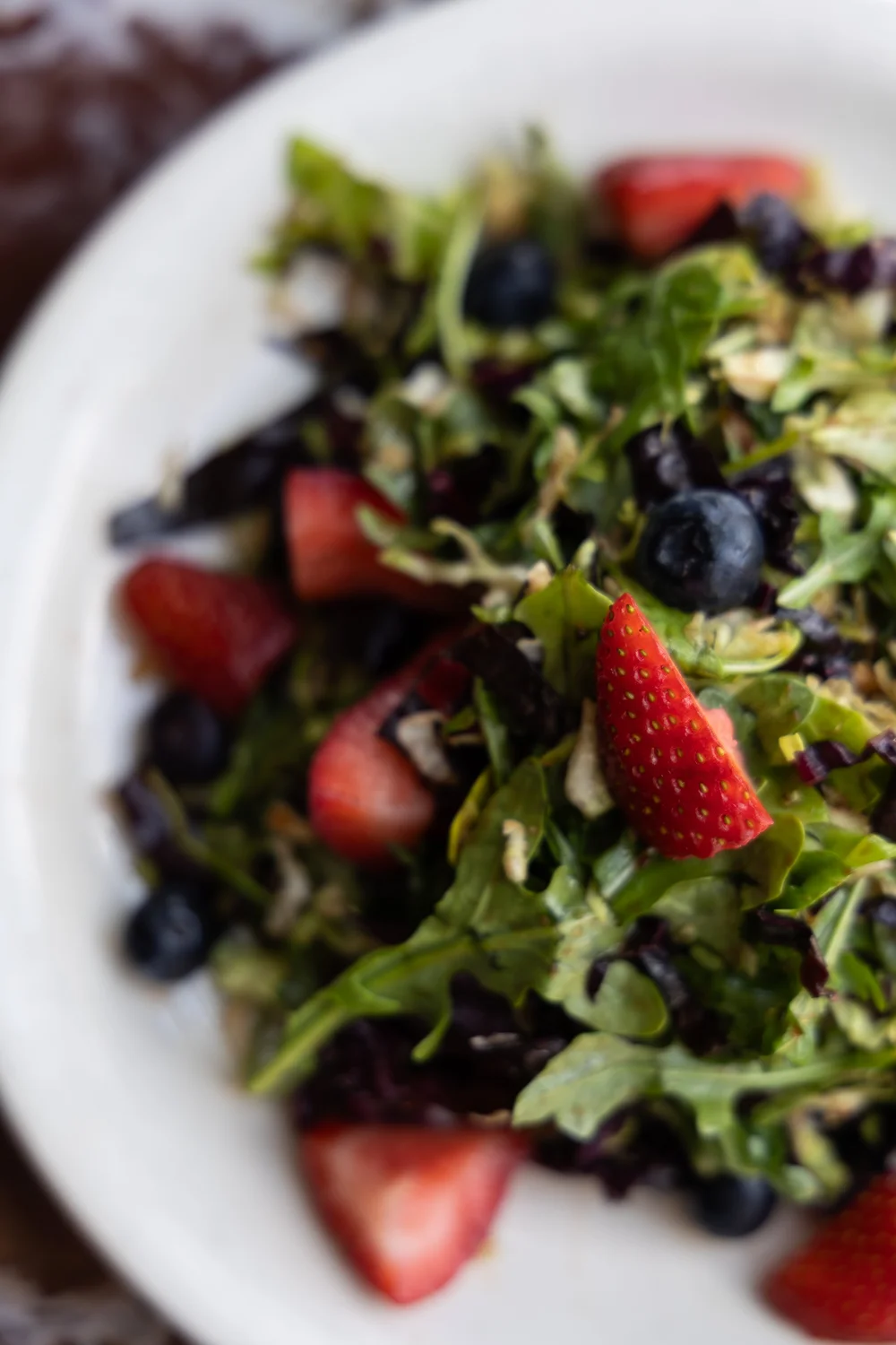 Fresh berry and greens salad plated at a Chattanooga restaurant