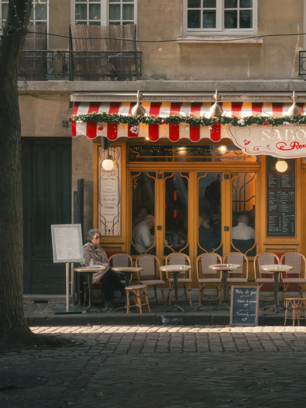 Paris café decorated for the beginning of the holiday season