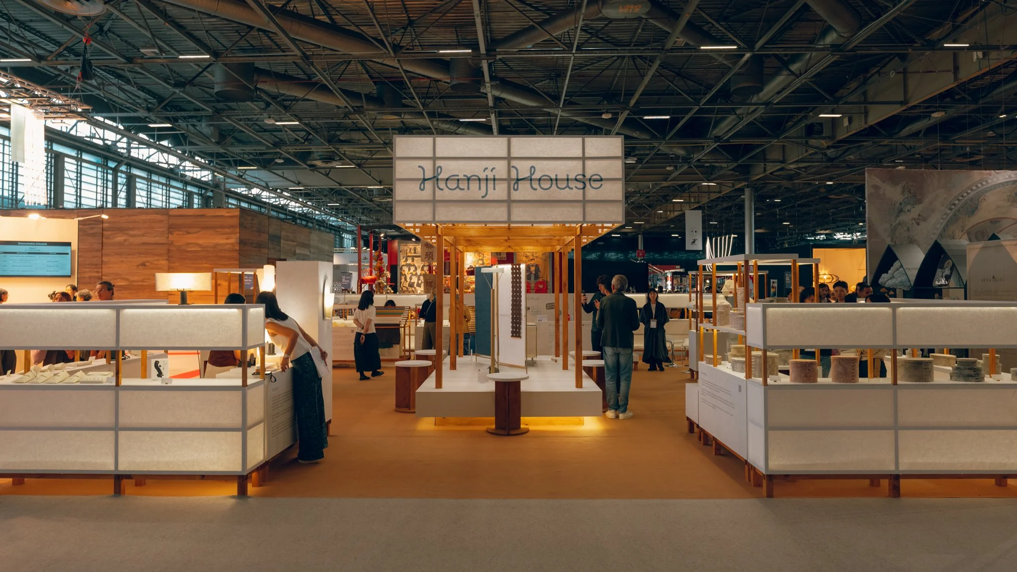 Wide view of the illuminated HANJI HOUSE pavilion at Maison et Objet Paris