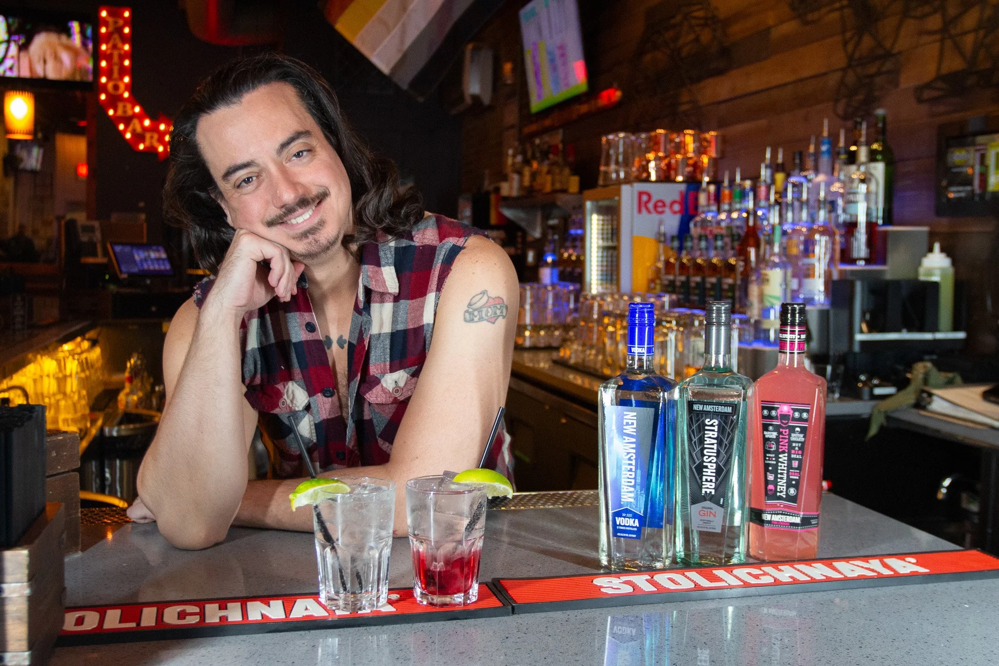 Bartender and cocktails at The SoFo Tap in Andersonville — daily drink specials and happy hour deals