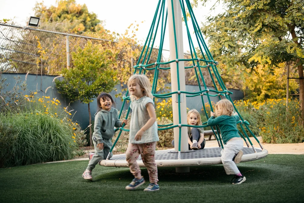 Children playing in the Lab School play yard