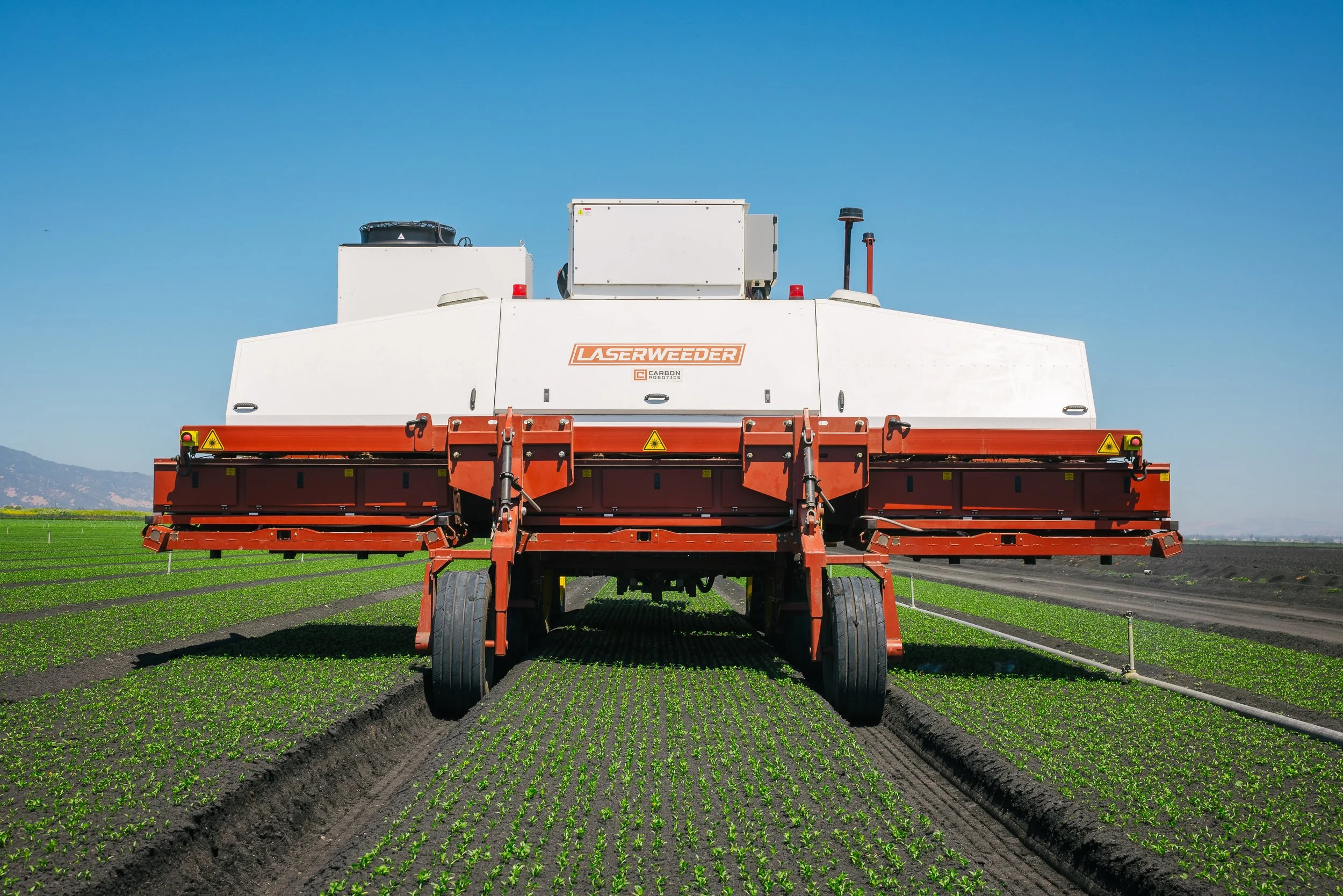 LaserWeeder pulled through a lettuce field