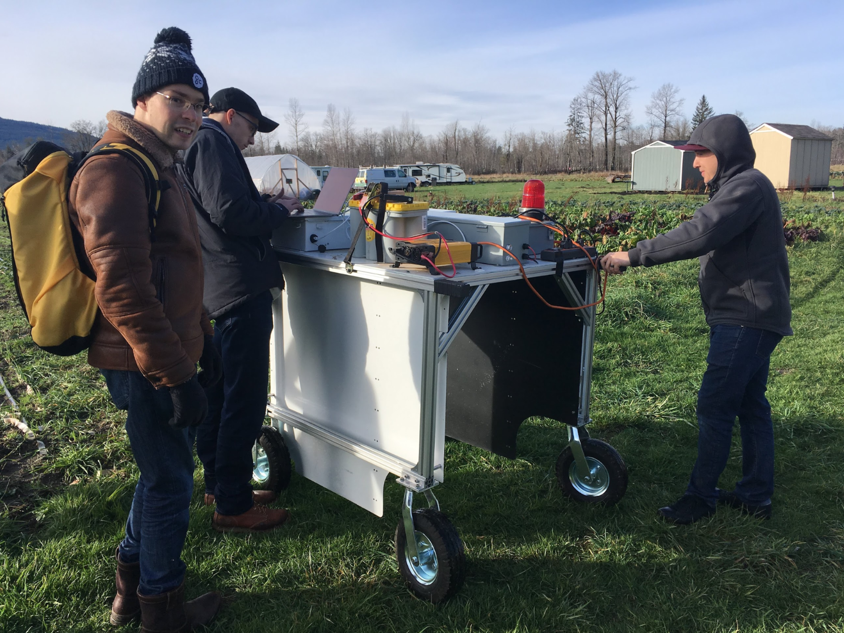 Laser Cart prototype being pushed through a field