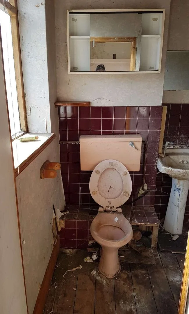 Before: the original bathroom fittings