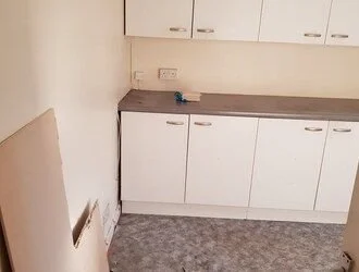 Former kitchen, now the bathroom