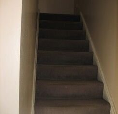 Original carpeted staircase