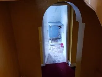 Kitchen before — old hallway to bathroom