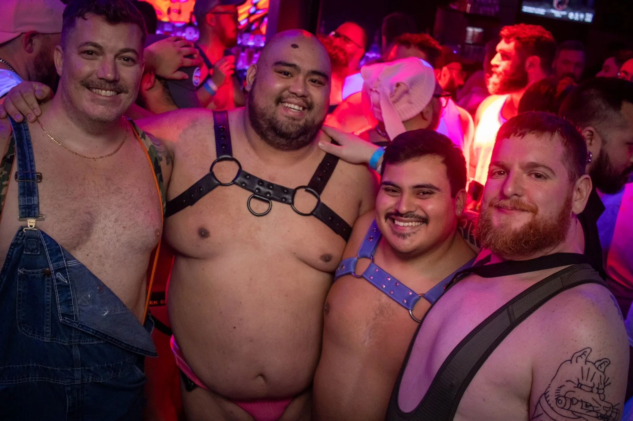 Guests dancing under colorful lights at Jackhammer Chicago