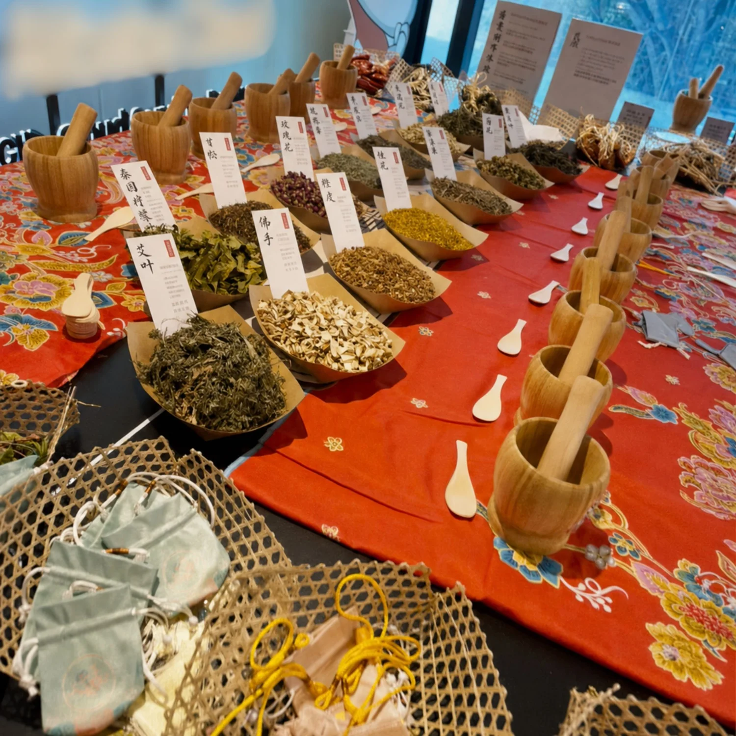 Qi Qi Boom TCM-inspired wellness workshop with herbs and sensory materials