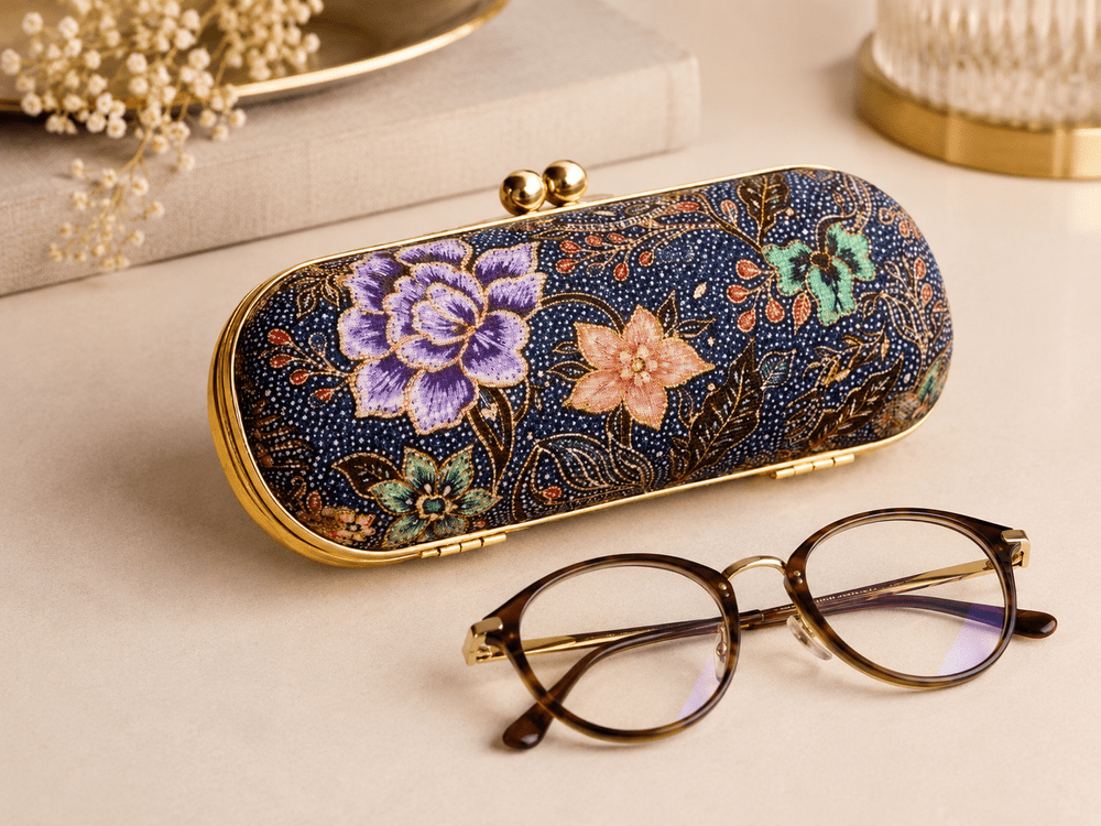 Decorative floral glasses case displayed with eyeglasses for everyday object craft and design learning