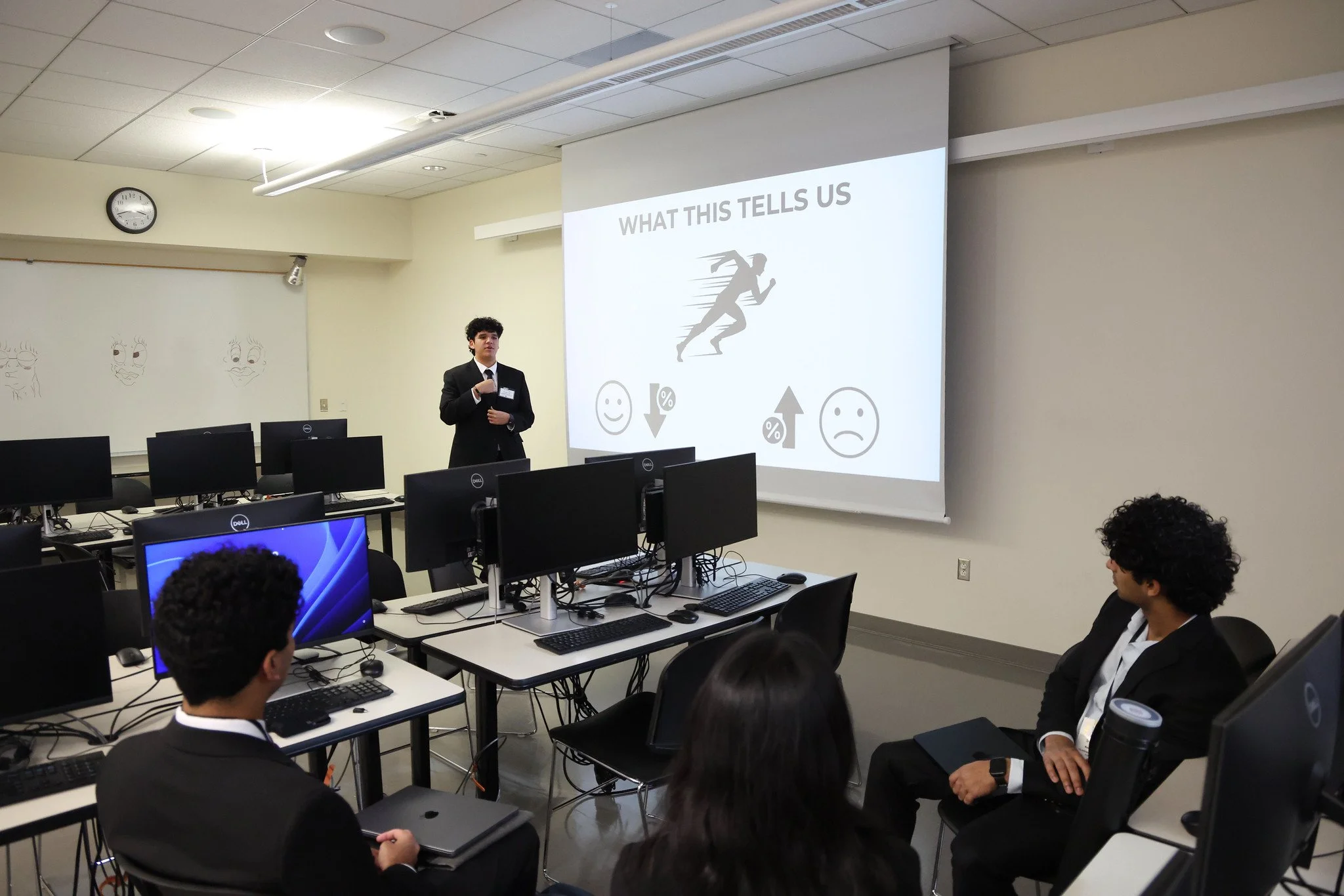 Student explaining project