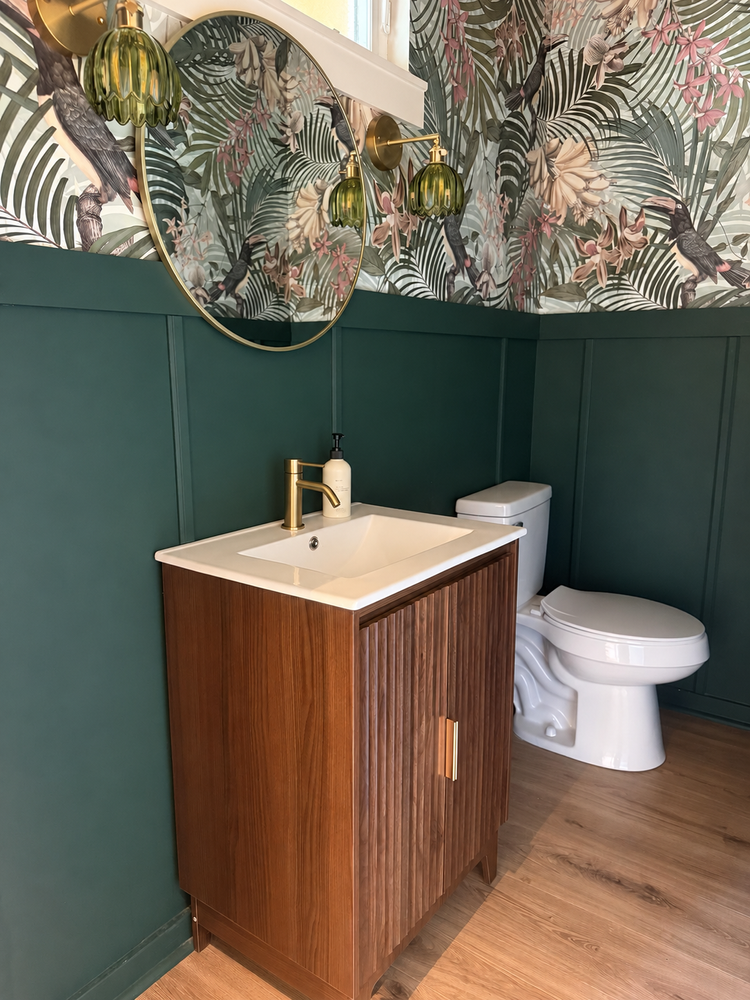 Louisville powder room remodel with green paneling, botanical wallpaper and brass fixtures