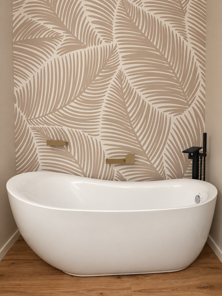 Bathroom remodel with a freestanding tub, patterned feature wall and wall-mounted fixtures
