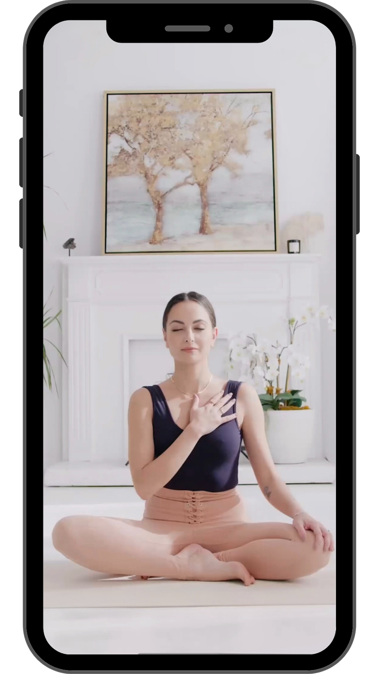 The Virtual Studio app on iPhone, showing Bee in seated meditation