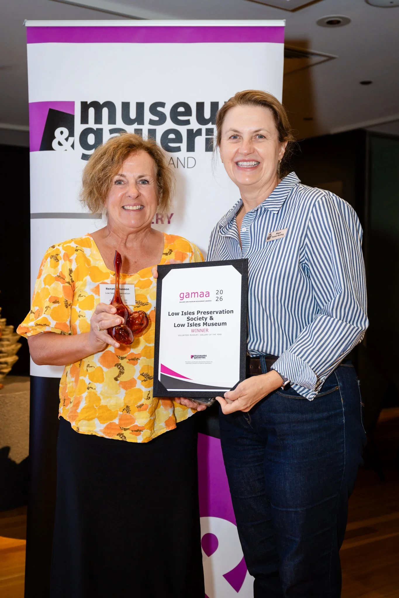 Mayor Teresa Harding presenting Renata Musson with the award