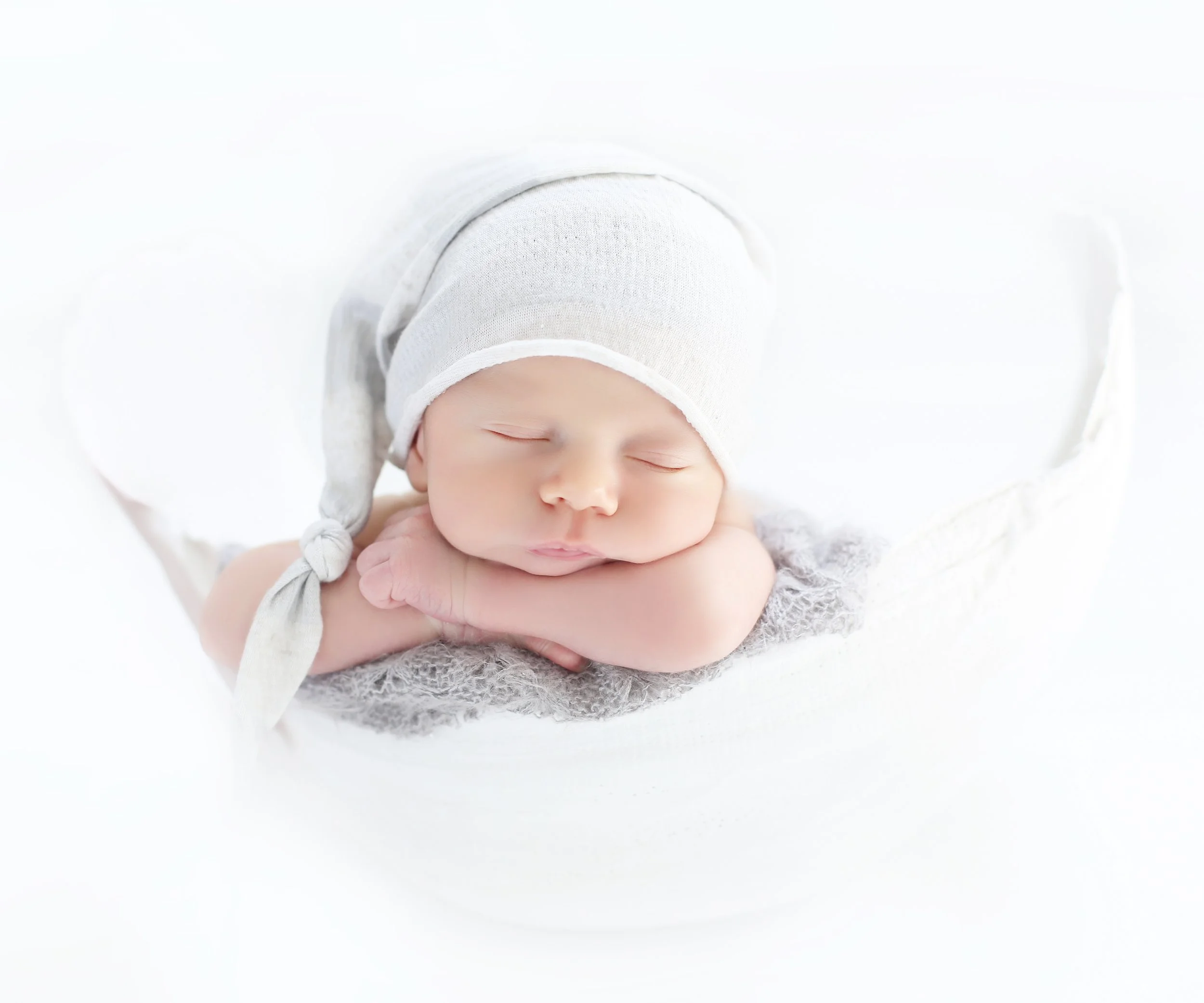 Belly cast used as a prop in a newborn session