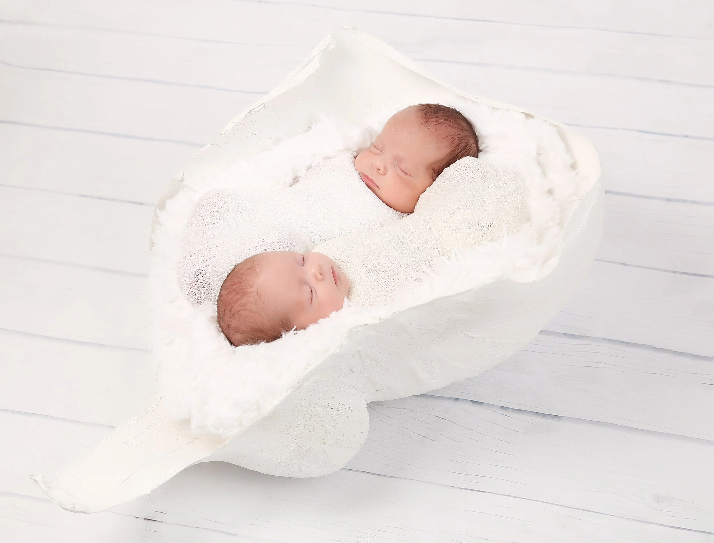 Belly cast photographed with the newborn