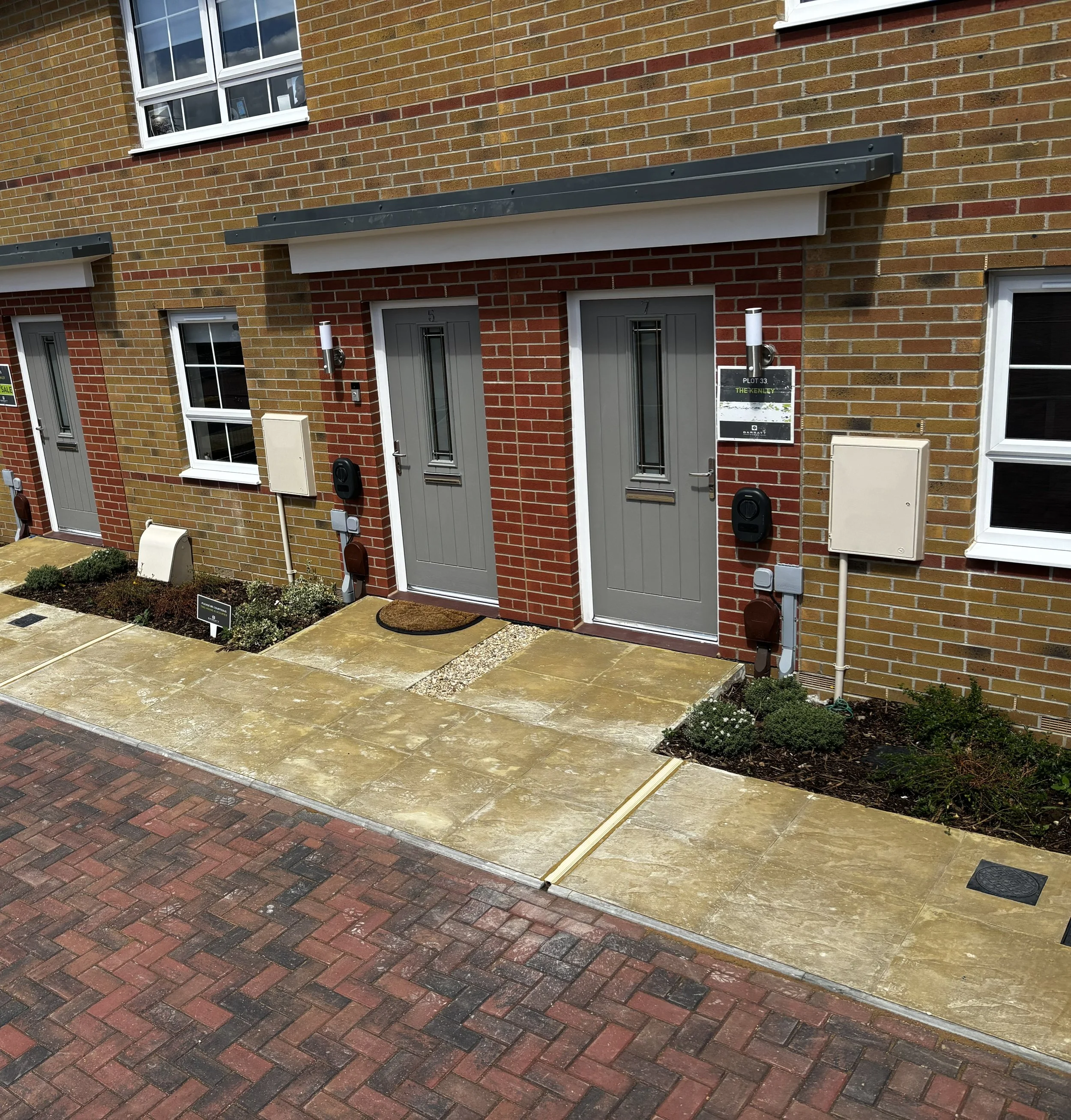 Kerbo Charge channel installed across the pavement on a new build development