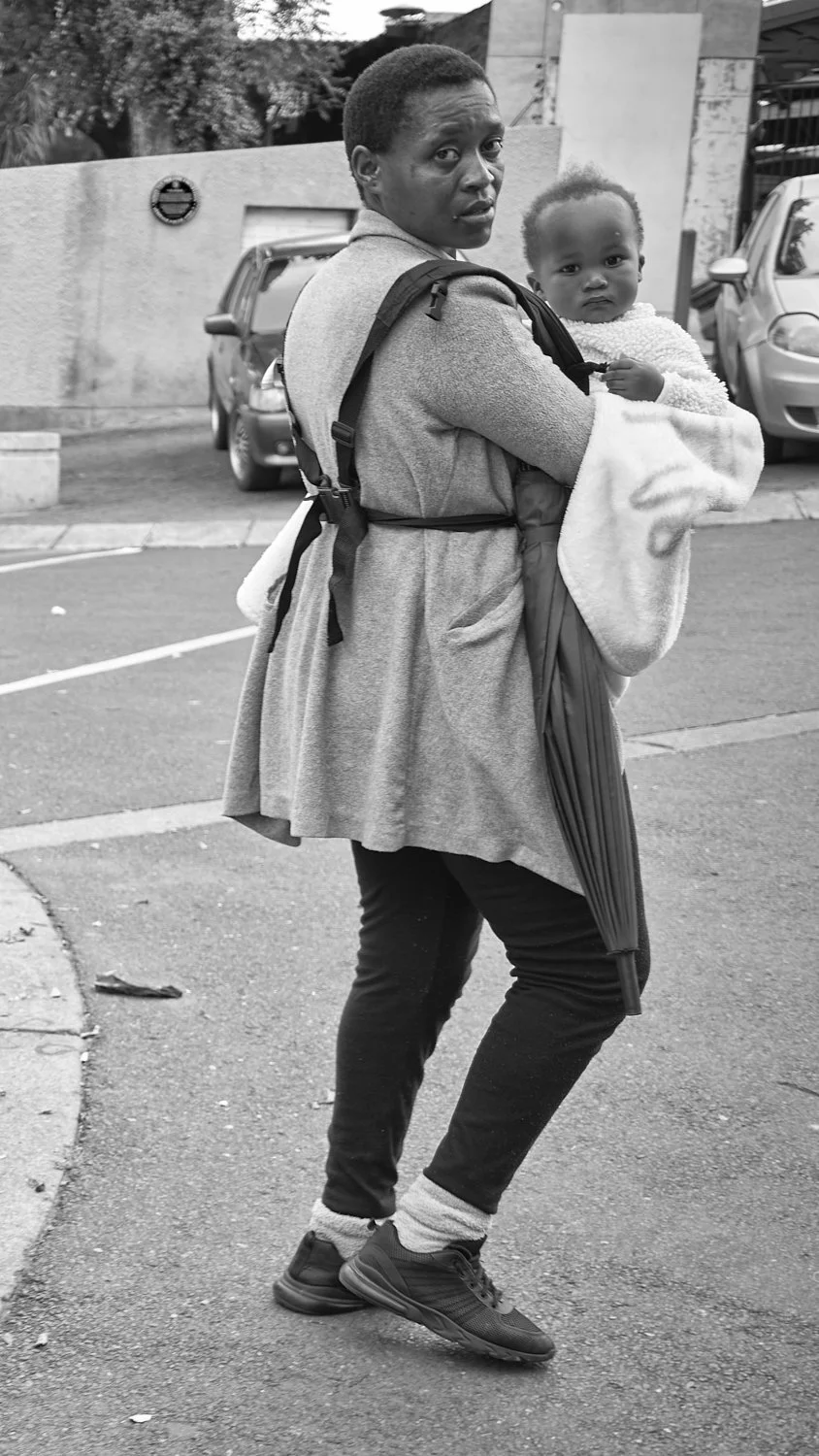 Woman with child — Soweto Township