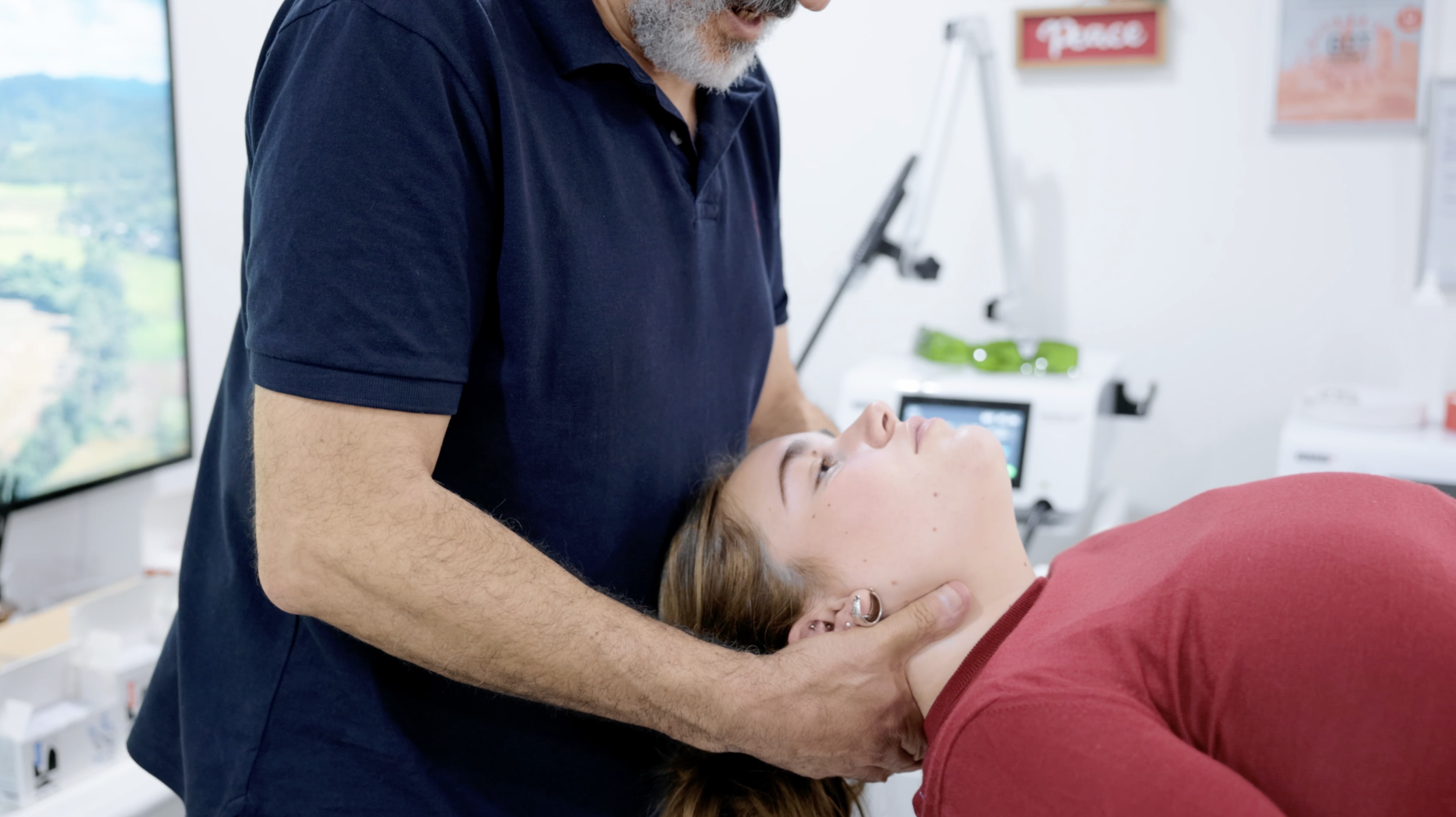 Physiotherapist treating a patient's arm