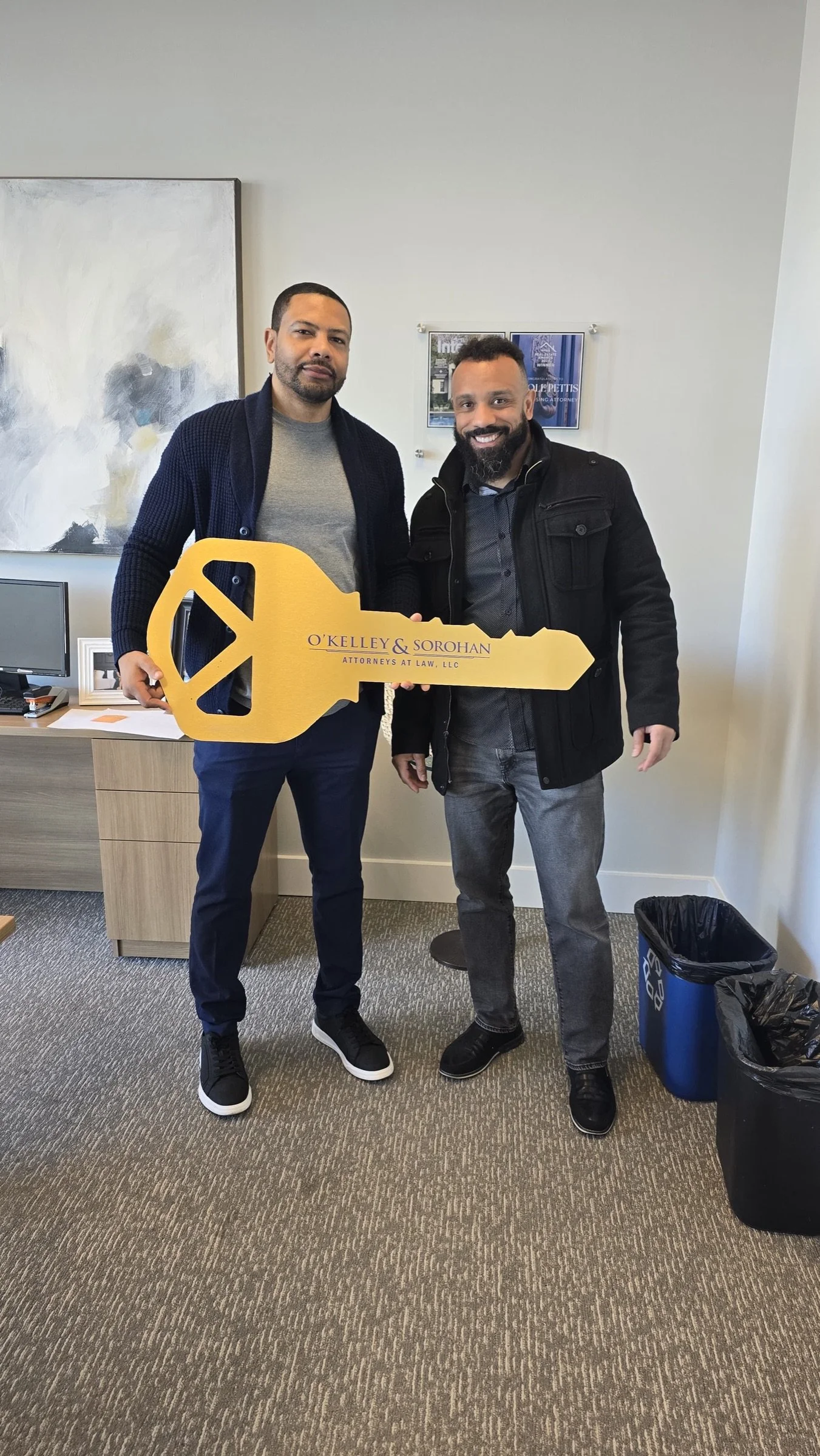 A client celebrating with the key after closing