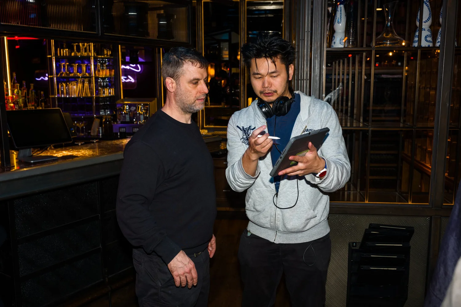 Jean-Paul Ly breaking down the action with DOP Thomas English on set