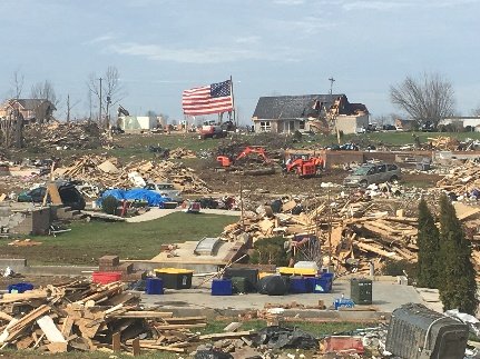 Helping Hands volunteers clearing debris after a tornado