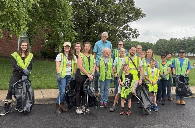 The Freedom Church outreach team in safety vests before a street cleanup