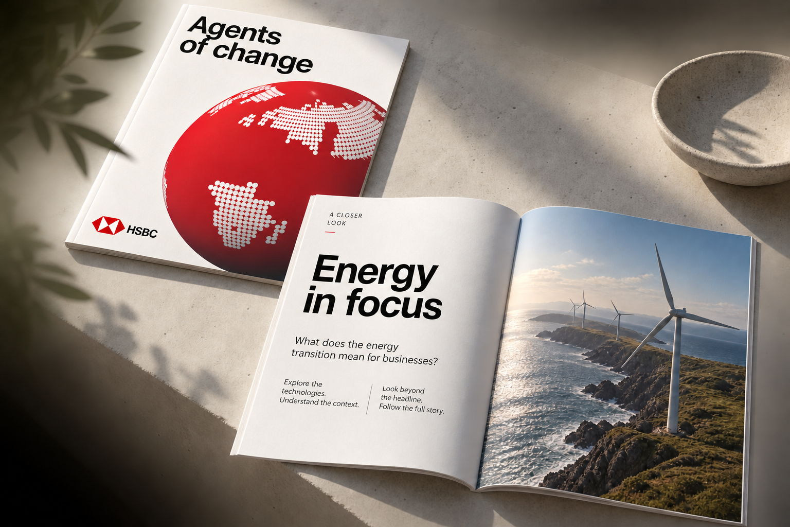 HSBC Agents of change editorial-journal concept on textured paper, with a red globe cover and an open wind-energy spread
