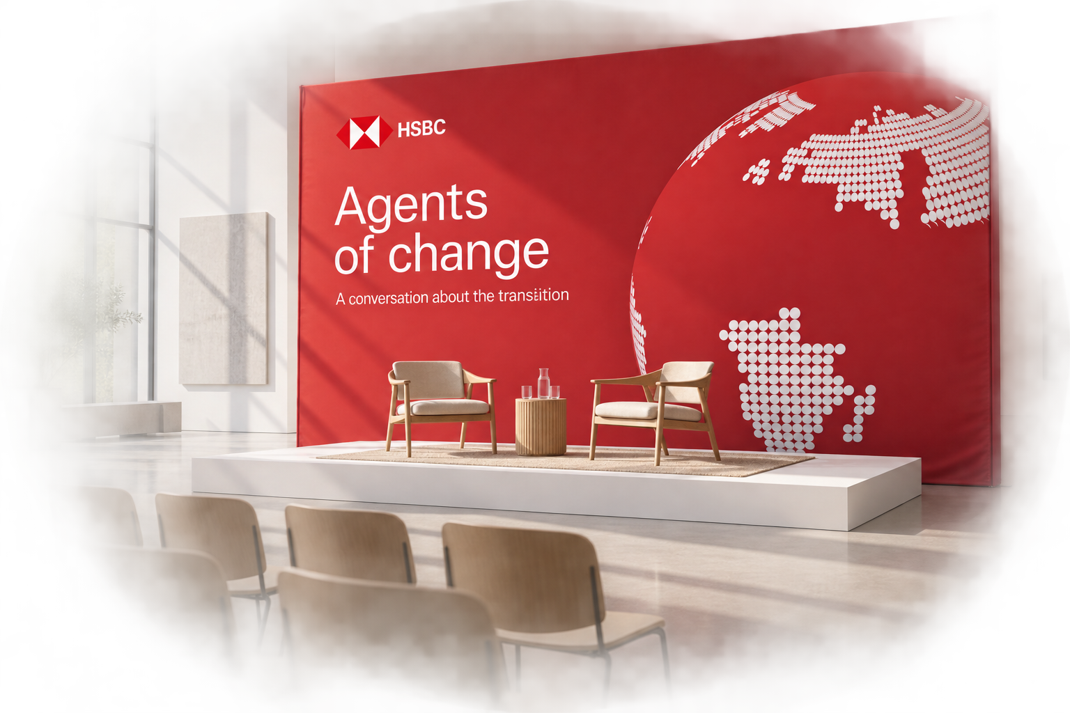 HSBC Agents of change event-setting concept with a red globe fabric backdrop, oak chairs and natural gallery light