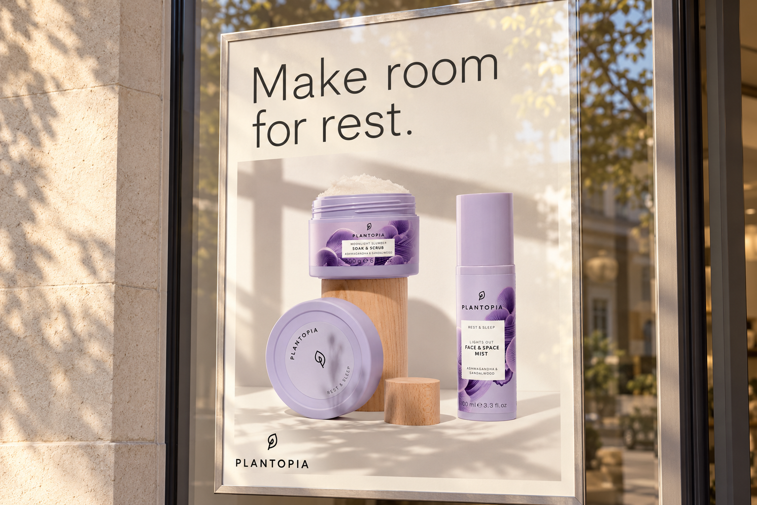 Plantopia retail-window campaign concept with the original lavender product imagery, printed on a large poster behind glass