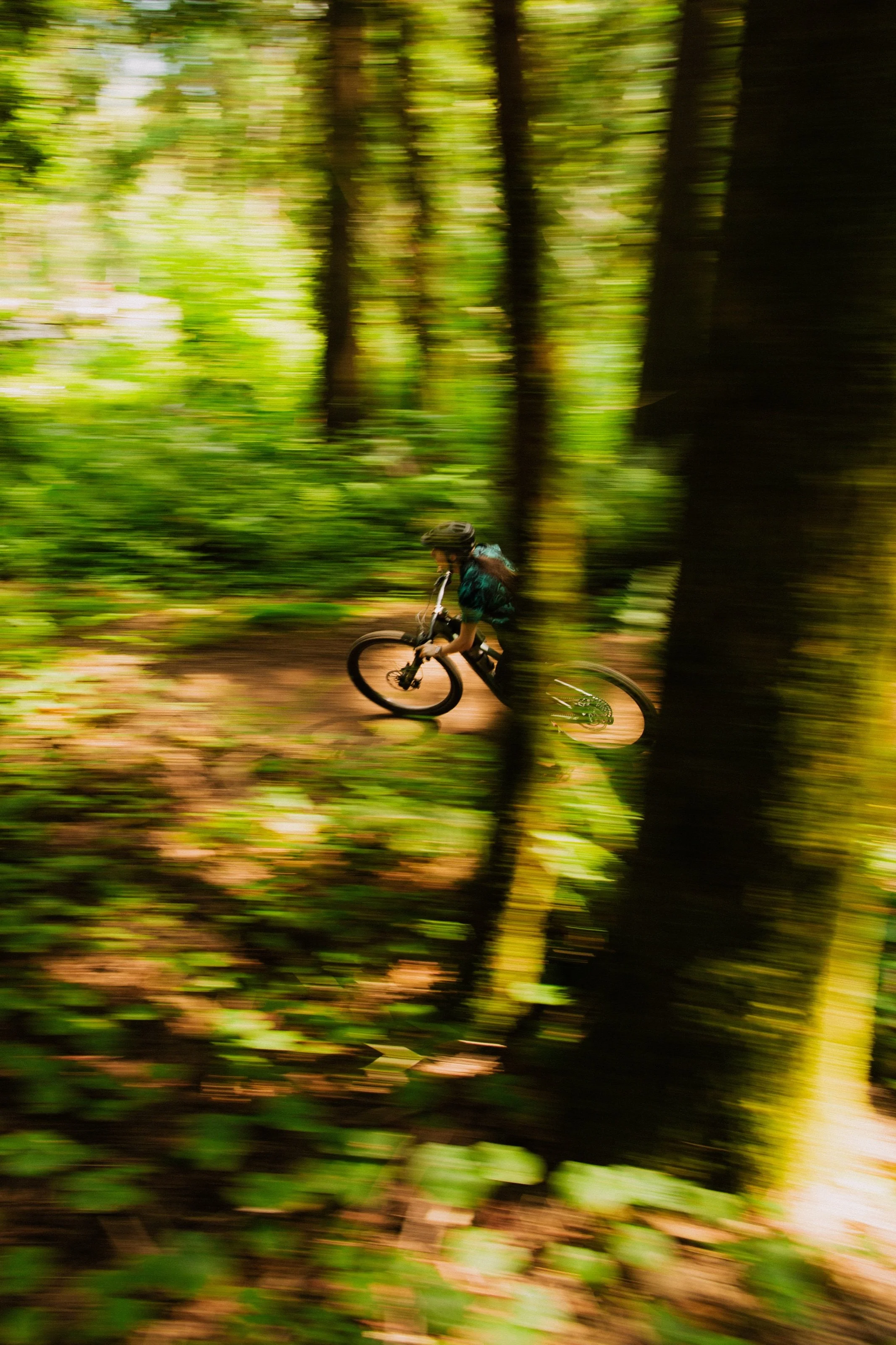 Rider on forest singletrack during the Friday Series group ride