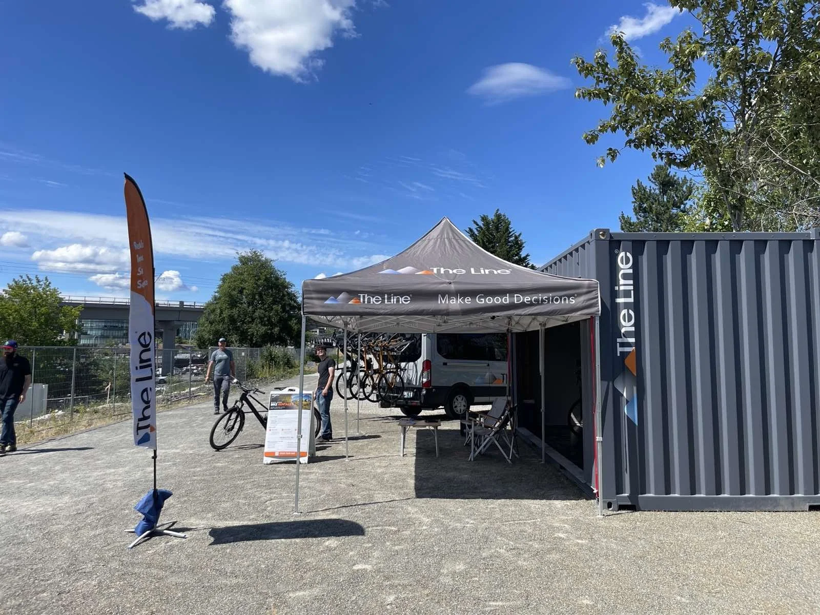 Wide view of The Line kiosk beside the Eastrail with the trail running past it