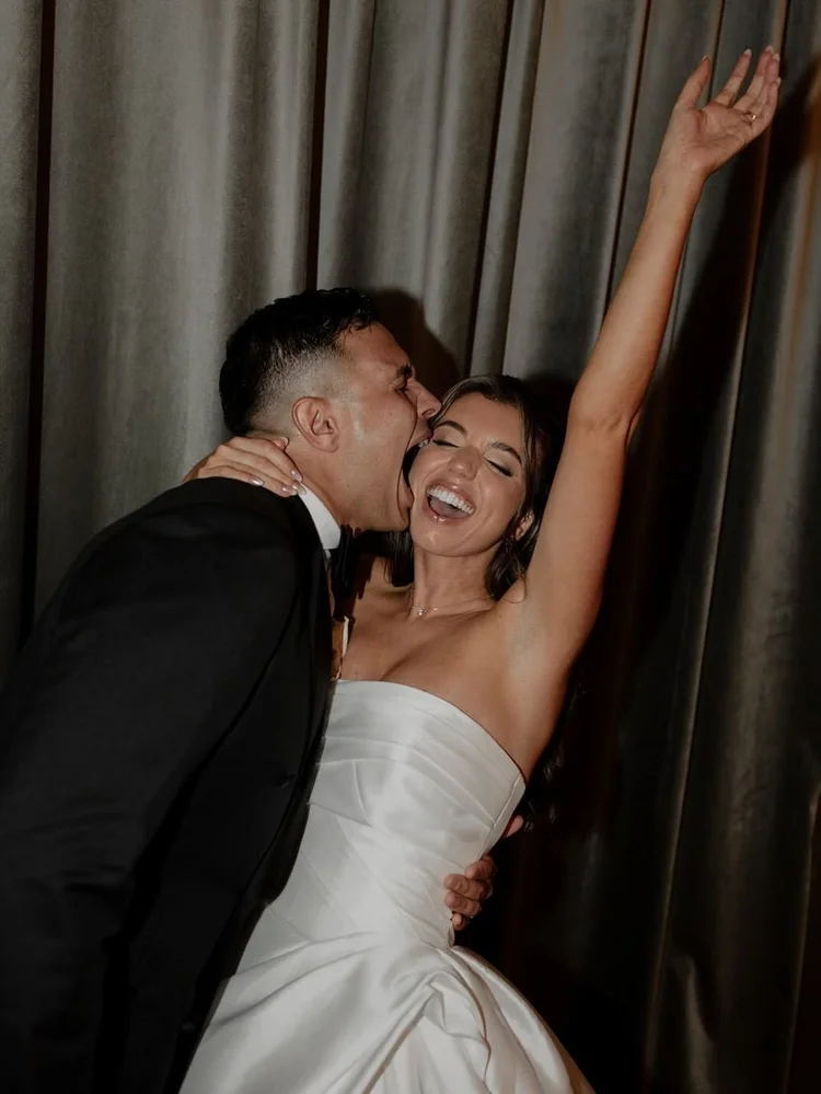 Bride and groom celebrating at the reception