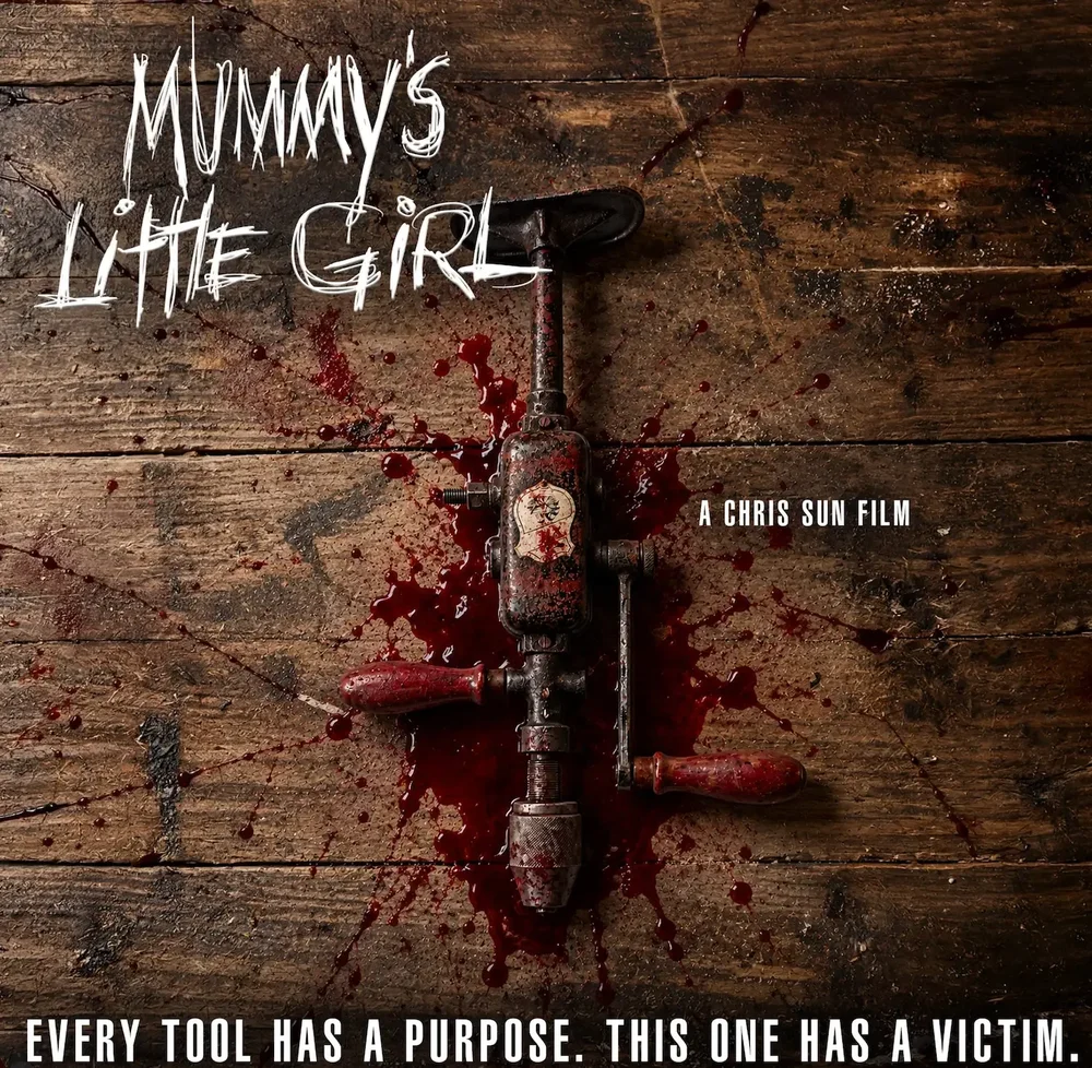 Mummy's Little Girl promo: a bloodied hand drill on a wooden workbench. Every tool has a purpose. This one has a victim.