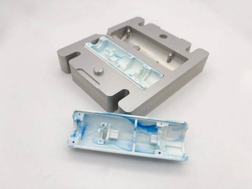 Injecting recycled polypropylene into the torch mould on an Injection Mini V2.