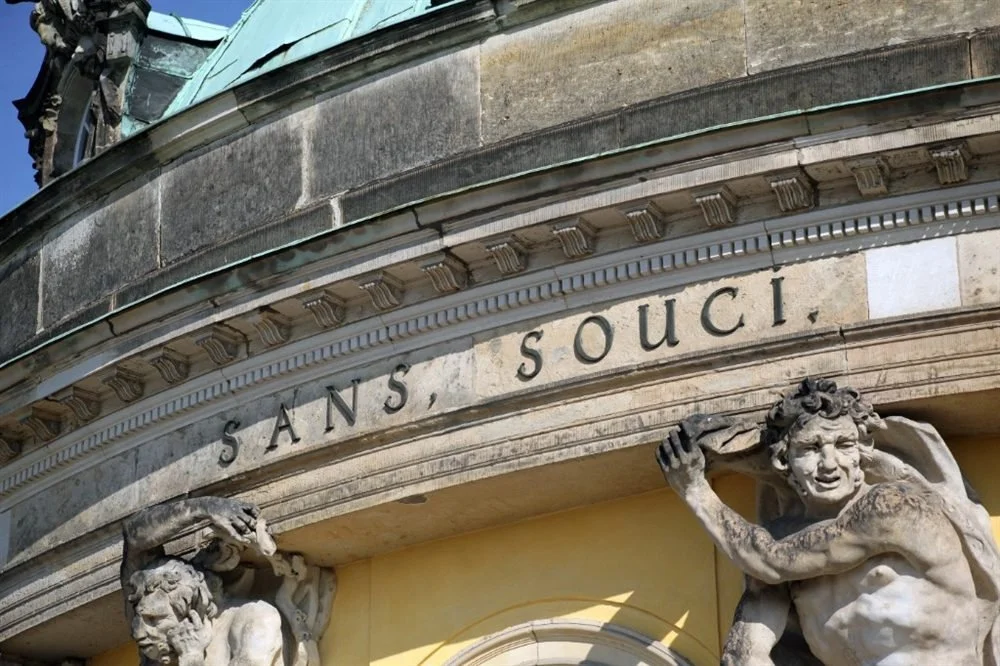 Close-up of Sanssouci Palace exterior with SANS, SOUCI inscription, Potsdam