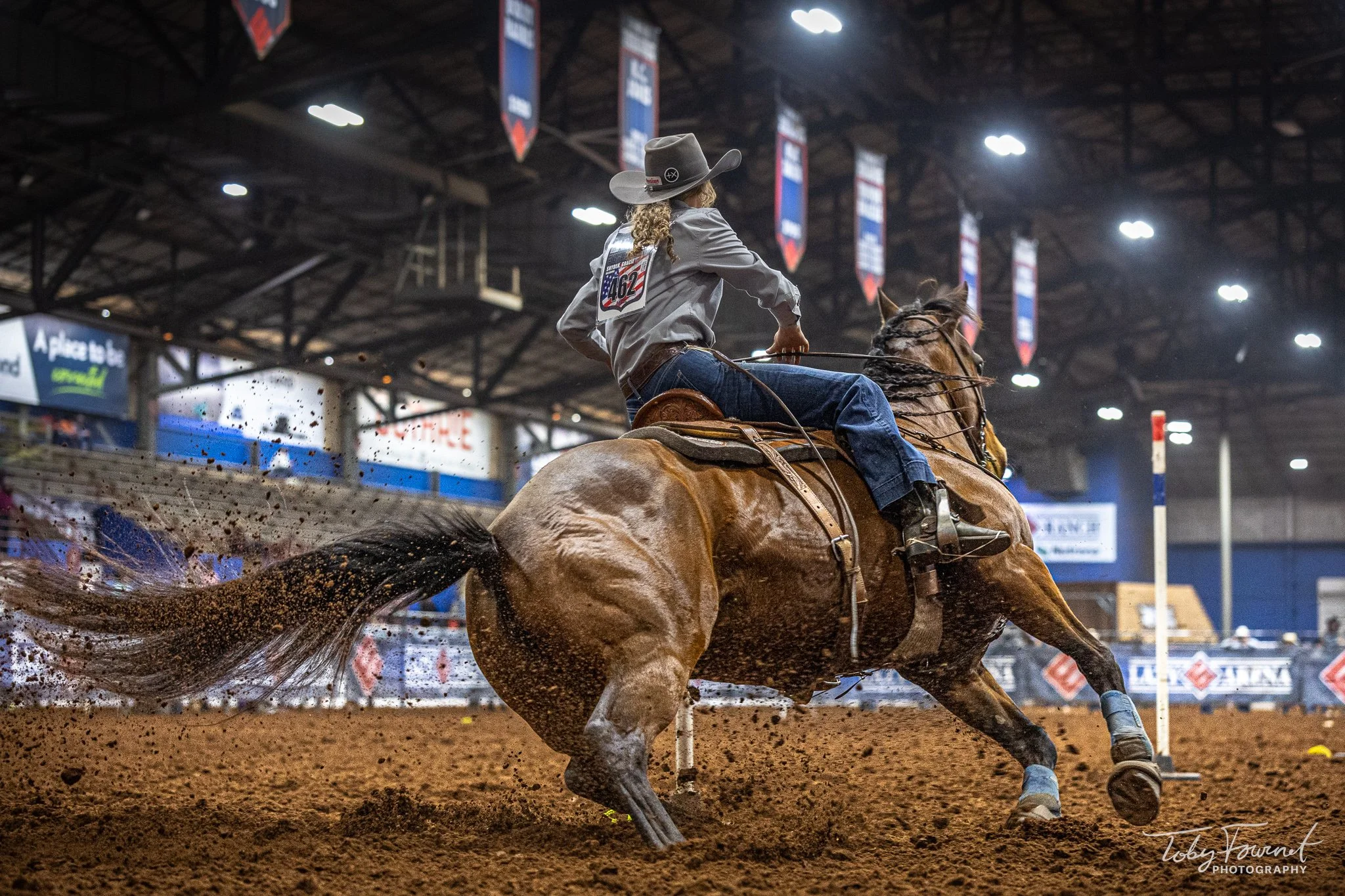 Horse and rider turning around a pole