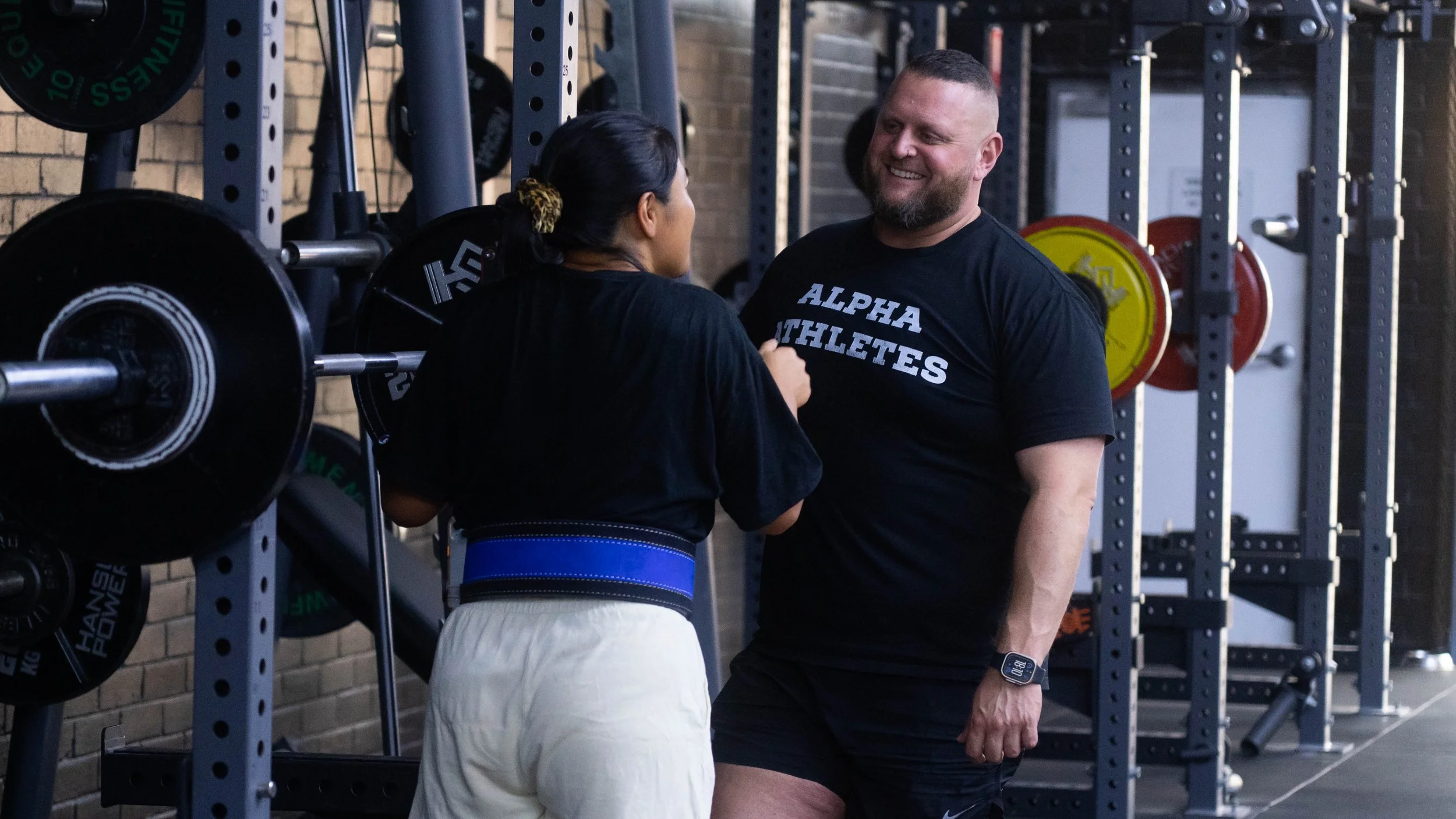 Training on the gym floor at Alpha Athletes