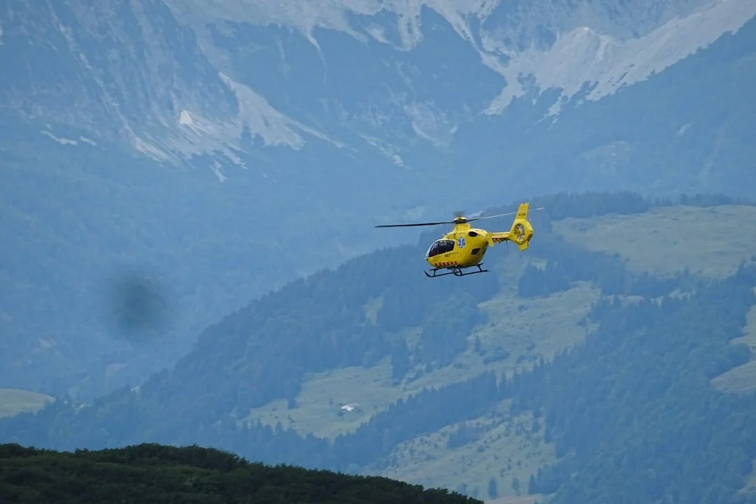 Helicopter over mountains